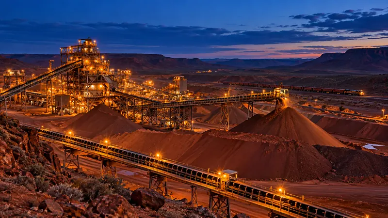 Iron ore processing facility at dusk